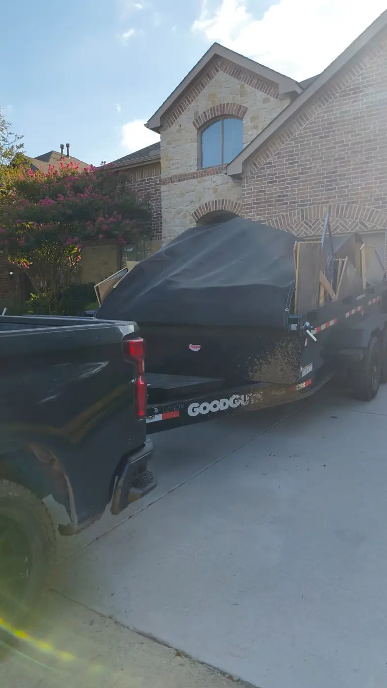 Pax trailer loaded with renovation debris during a Frisco cleanup